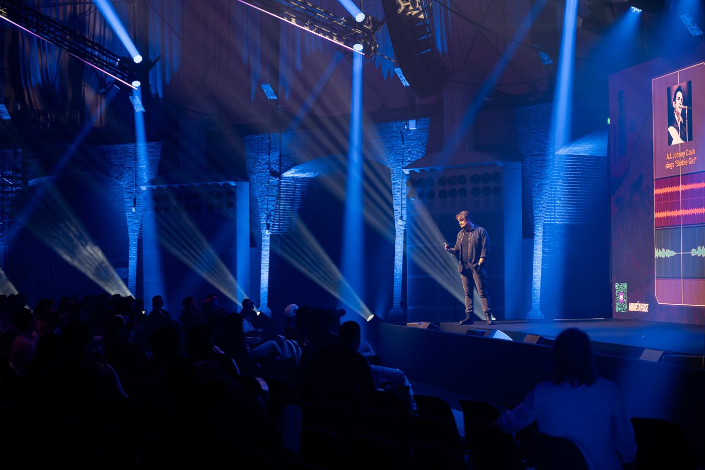 Concert-blue stage lighting during the keynote